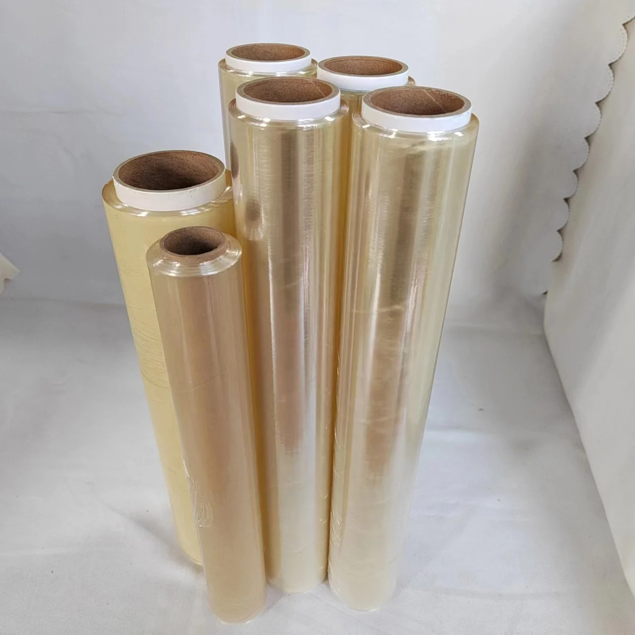 High quality Food grade 35cm*40m Wrapping film with cutter pvc stretch film pvc cling film With 100% Breathable Pvc Compound