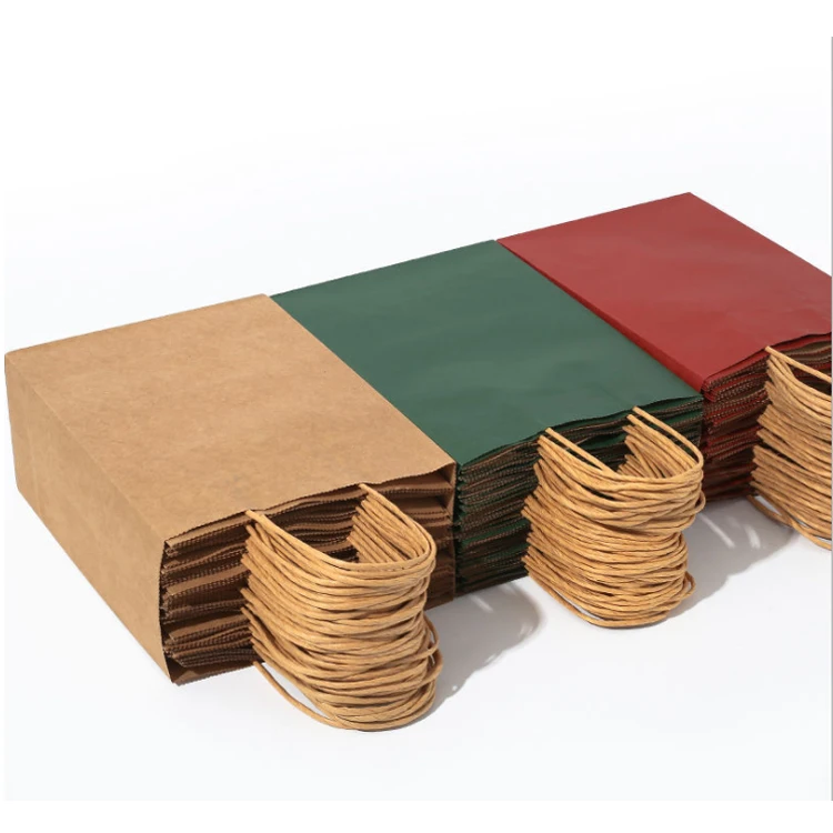 Factory wholesale kraft paper treat bags for clothes kraft paper bag with handles