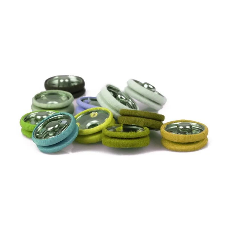 Fabric covered snap button and fancy cover snap