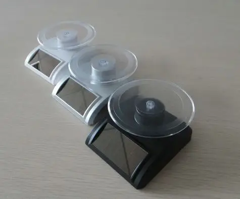 Free Technic Support solar watch display shelf solar acrylic display/lipstick display/round rotating solar power tools solar toy