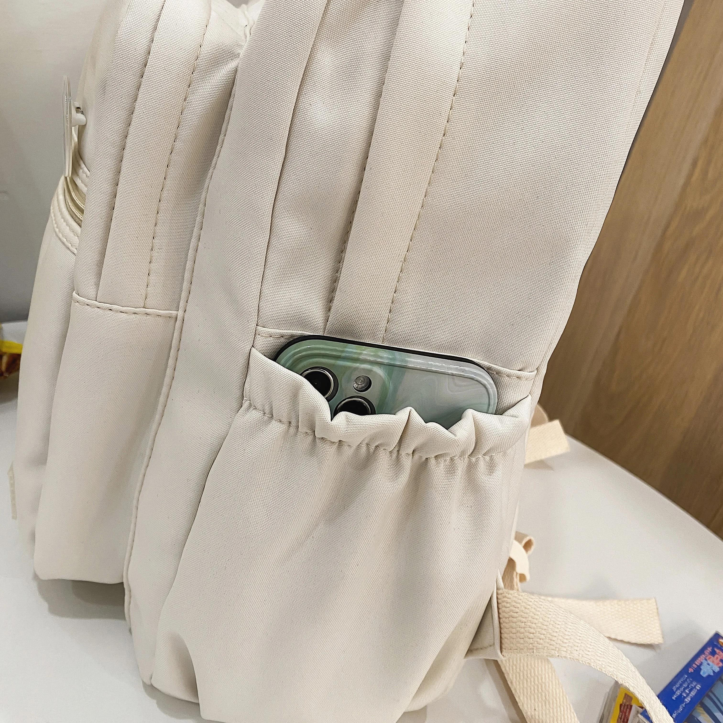 Hot sale new design large capacity cheap waterproof nylon teenagers school bags wholesale custom logo backpack