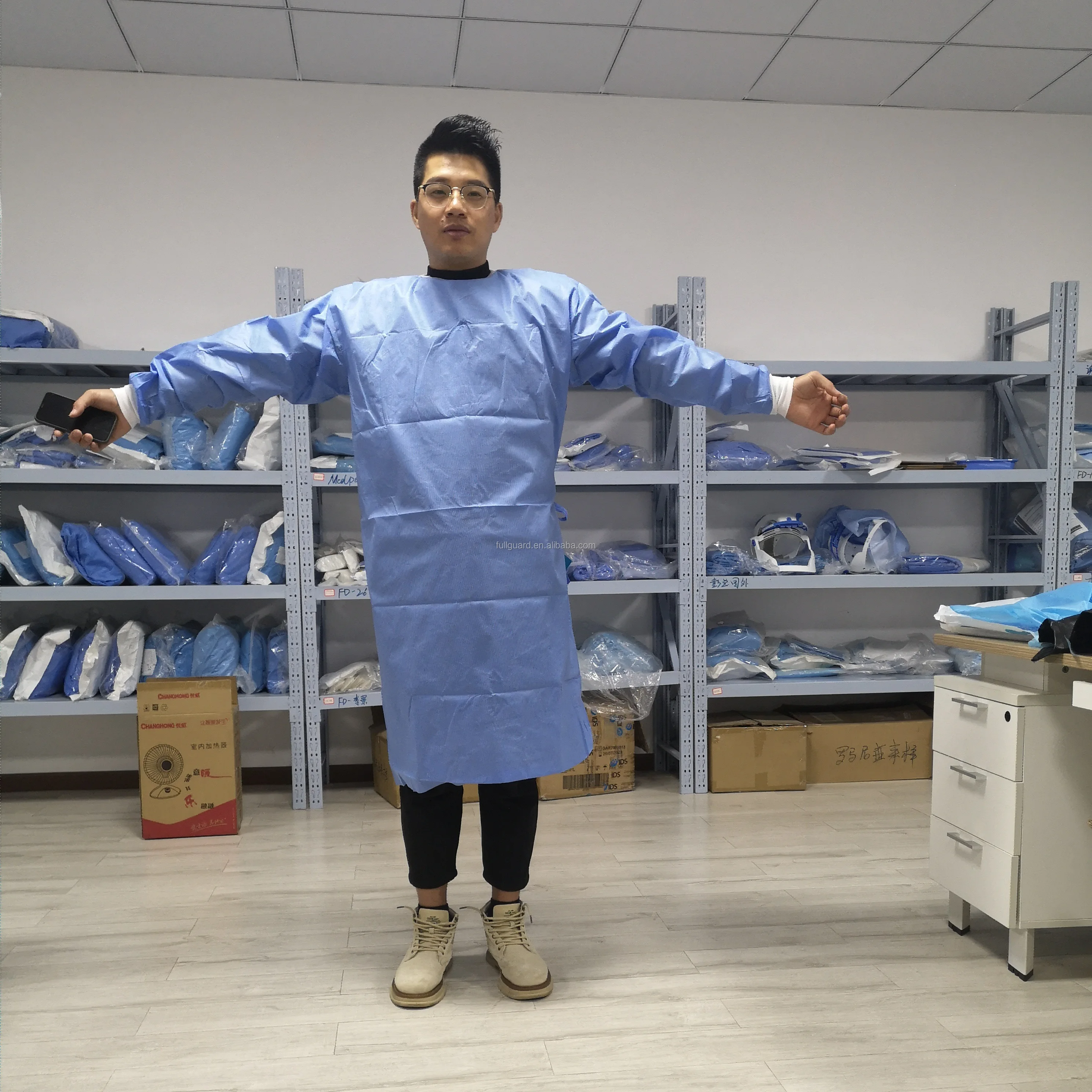 Normal Stitch Cheap SMS PP Isolation Gown made of SMS Non-woven fabric with ANSI AAMI PB70:2012 Standard