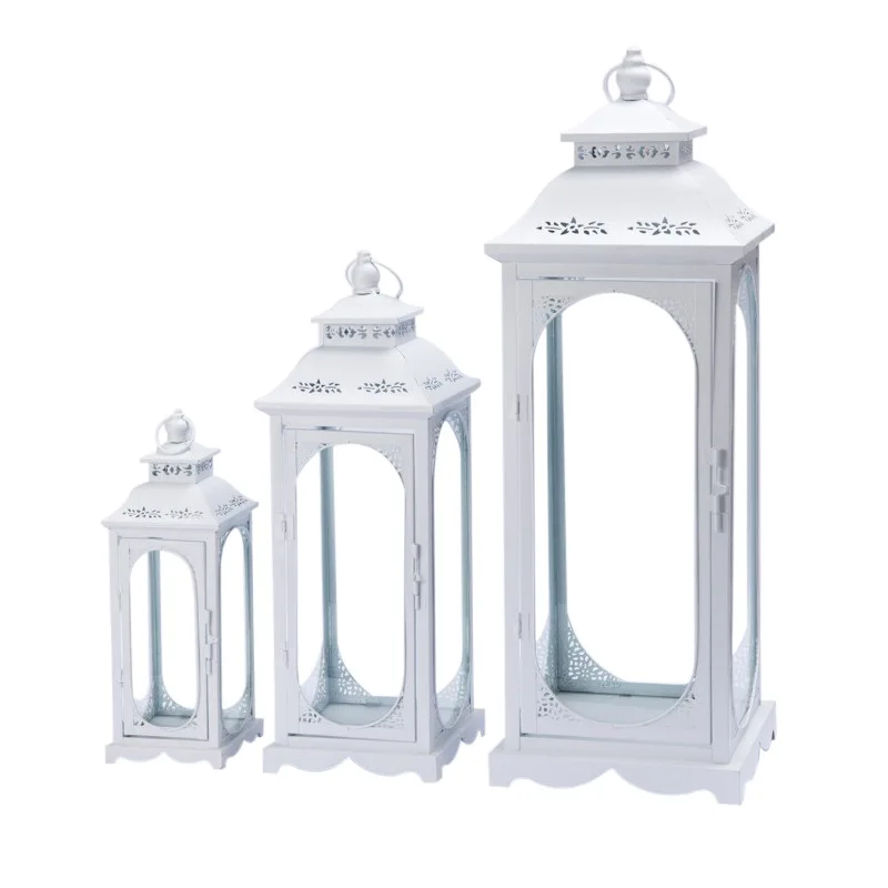 European retro hollow wind lamp, handicraft decorative ornaments, wrought iron glass metal candle holder wind lamp