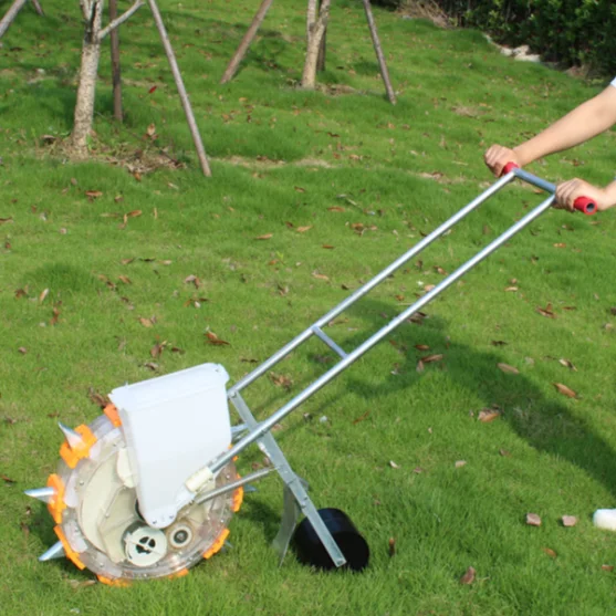 Hand-propelled household small roller seeder for planting corn, soybean, cotton and wheat