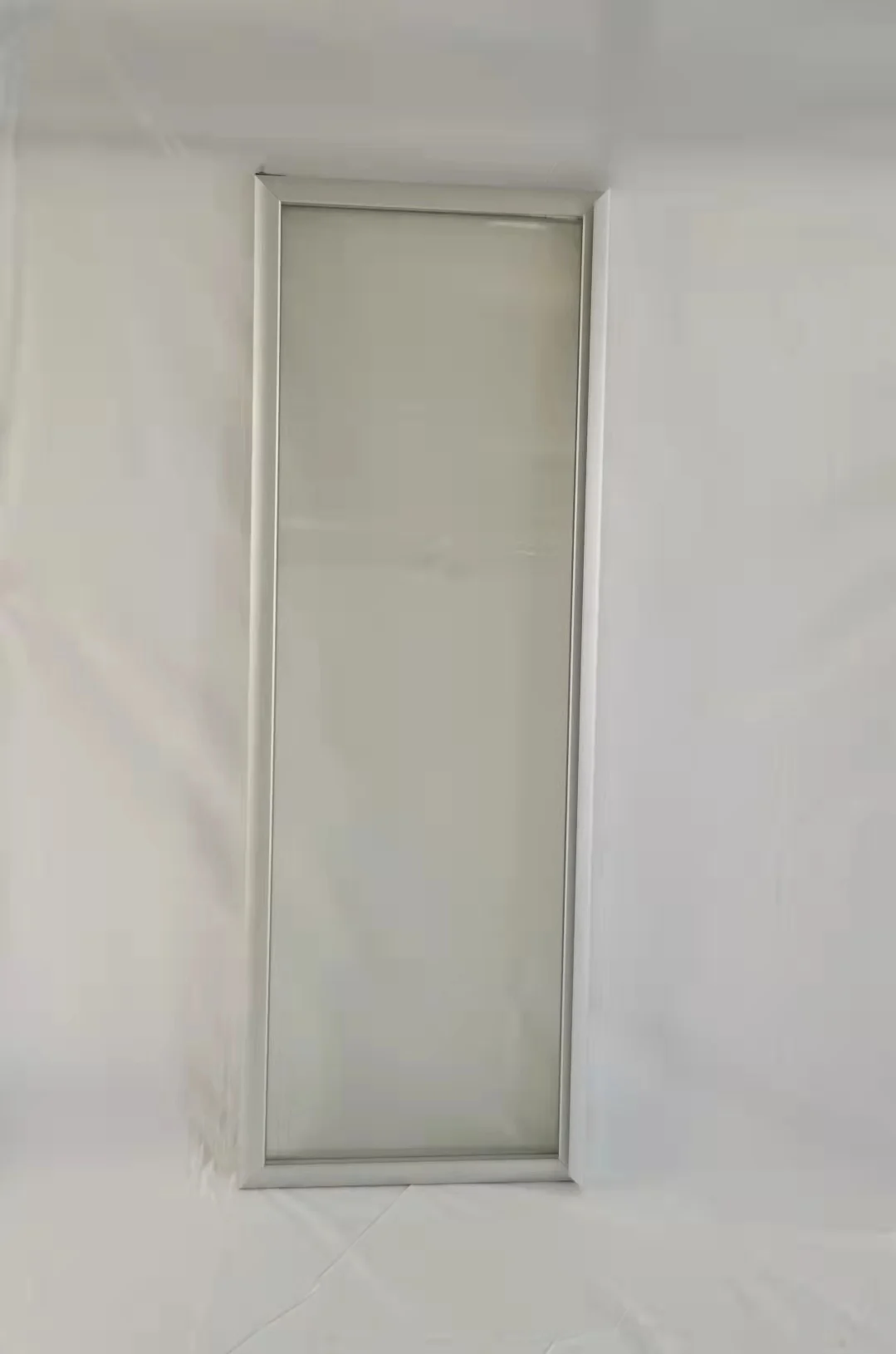 Freezer electric heated laminated glass door