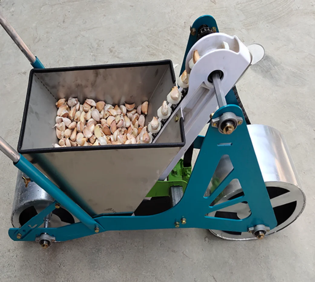 Hand push single row manual  garlic seeder corn planter for sale