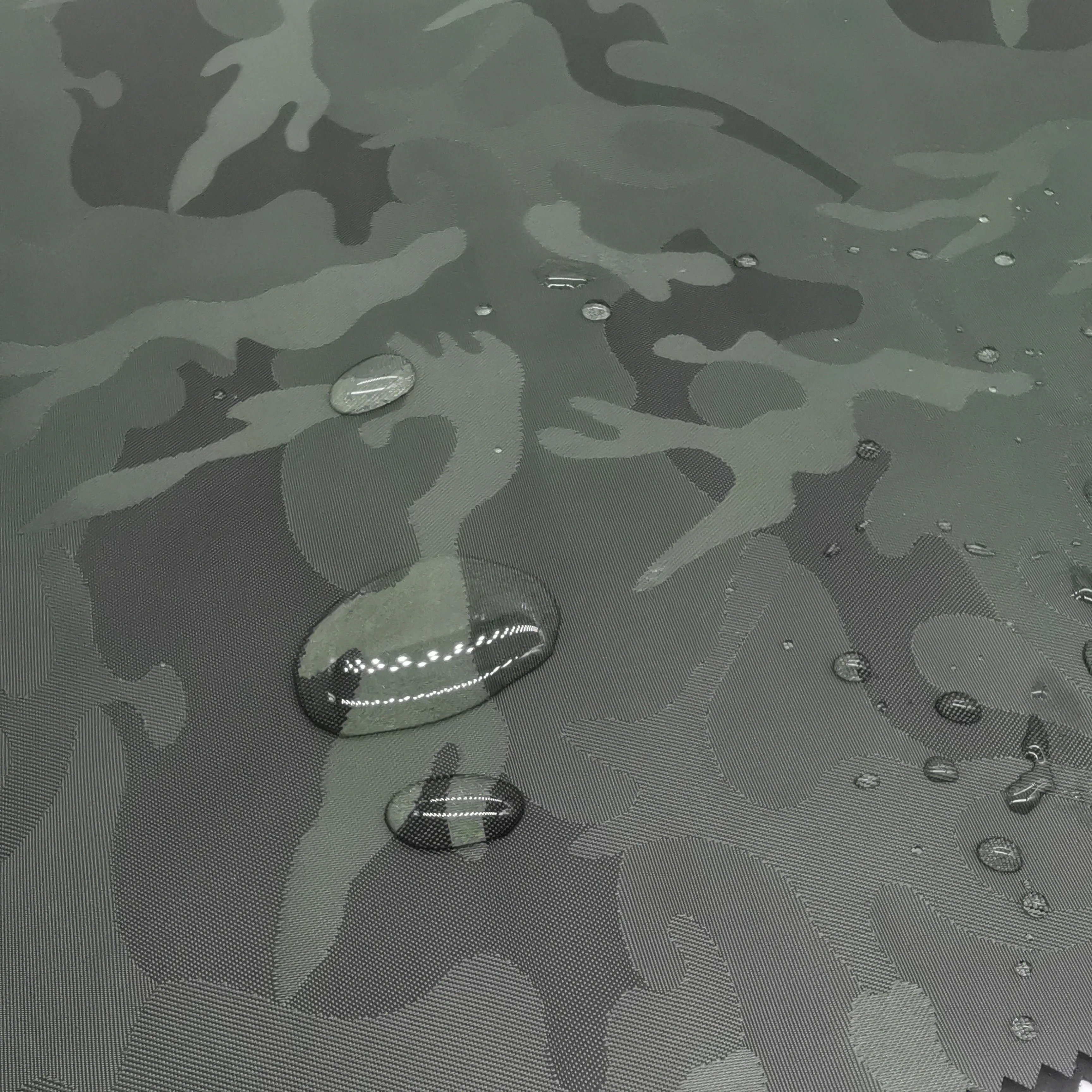 hot-selling camouflage jacquard Oxford fabric bonded knitted fabric with backpack