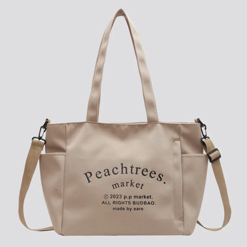 Student class canvas bag Female 2023 new fashion letter Tote commuter large capacity single shoulder crossbody bag