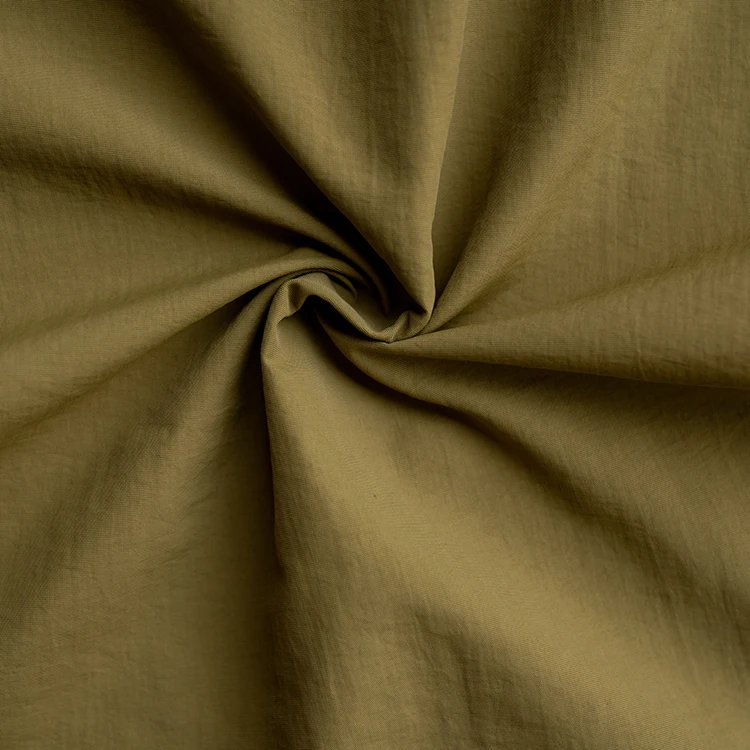 Manufacturer custom plain solid 100% nylon fabric textile cotton like soft jaket fabric taslon fabric for winter jacket
