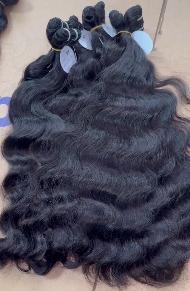Волнистые завитки Необработанные индийские пряди волнистые вьетнамские волосы оптовая продажа 100% девственные курчавые