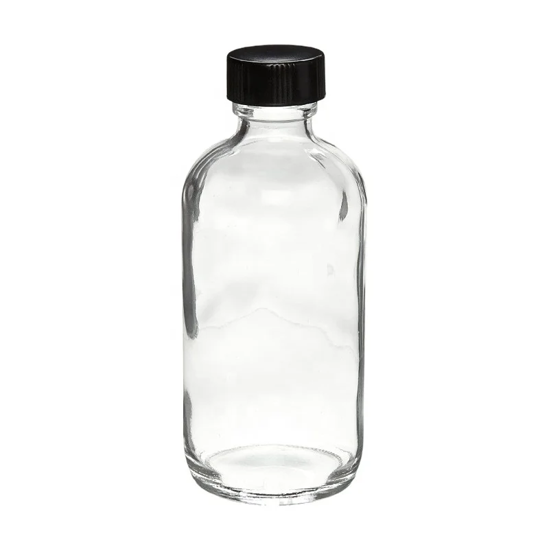 Factory price 2 oz boston round clear glass bottle with bakelite cap  boston round  bottle