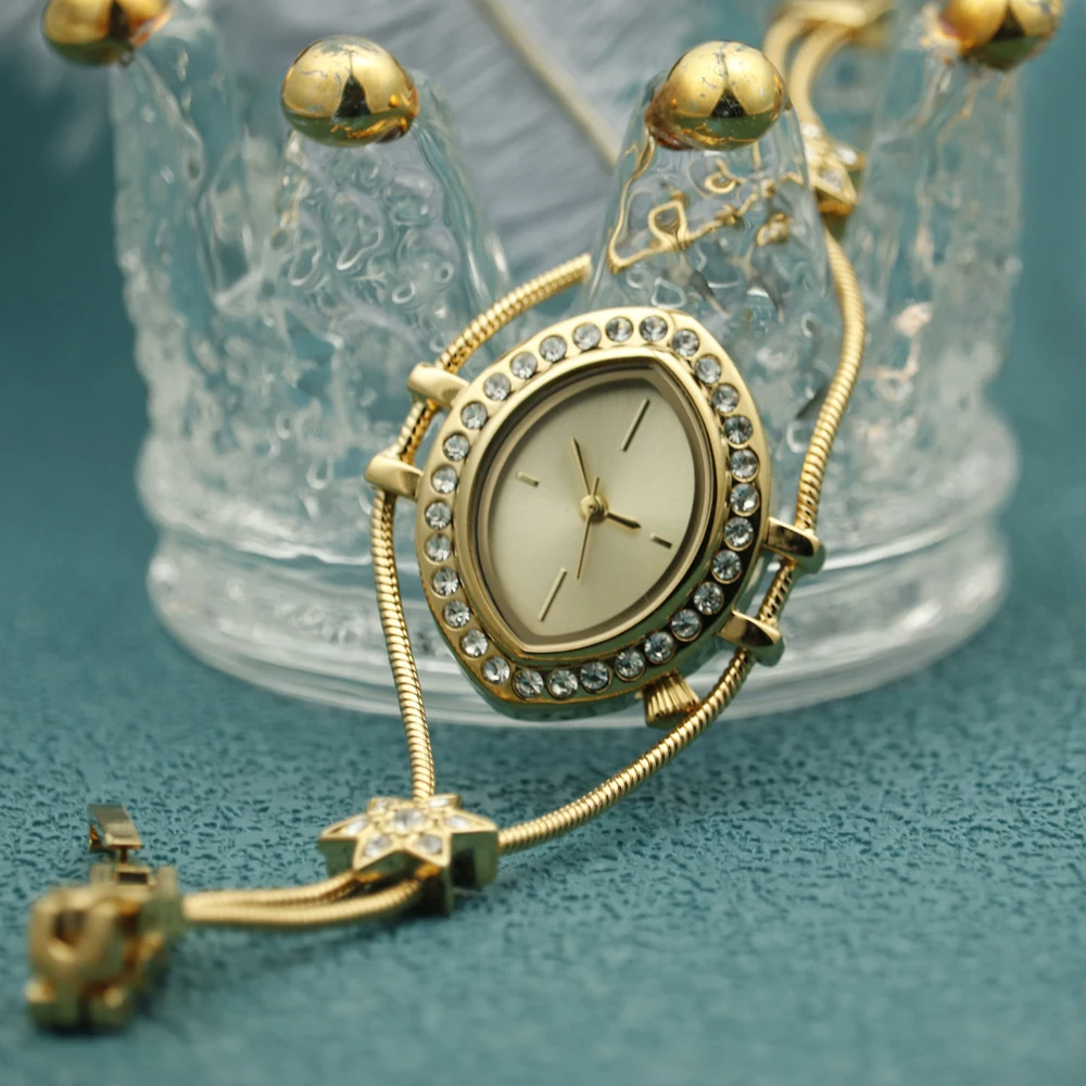 Alloy diamond lady watch top brand custom eyes special shape new style popular luxury OEM wholesale women girls watch in bulk