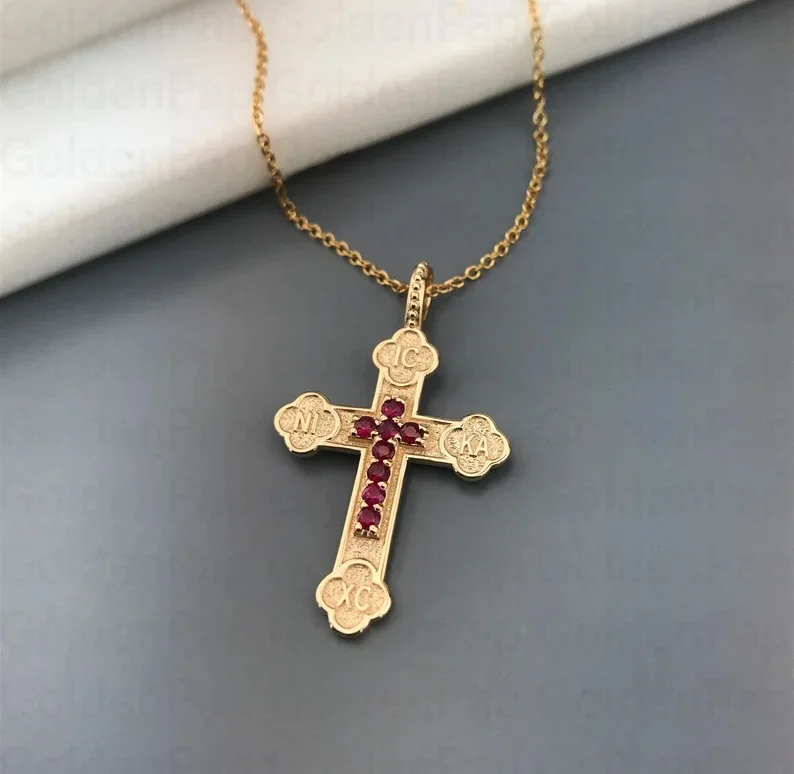 14k solid gold cross with real rubies
