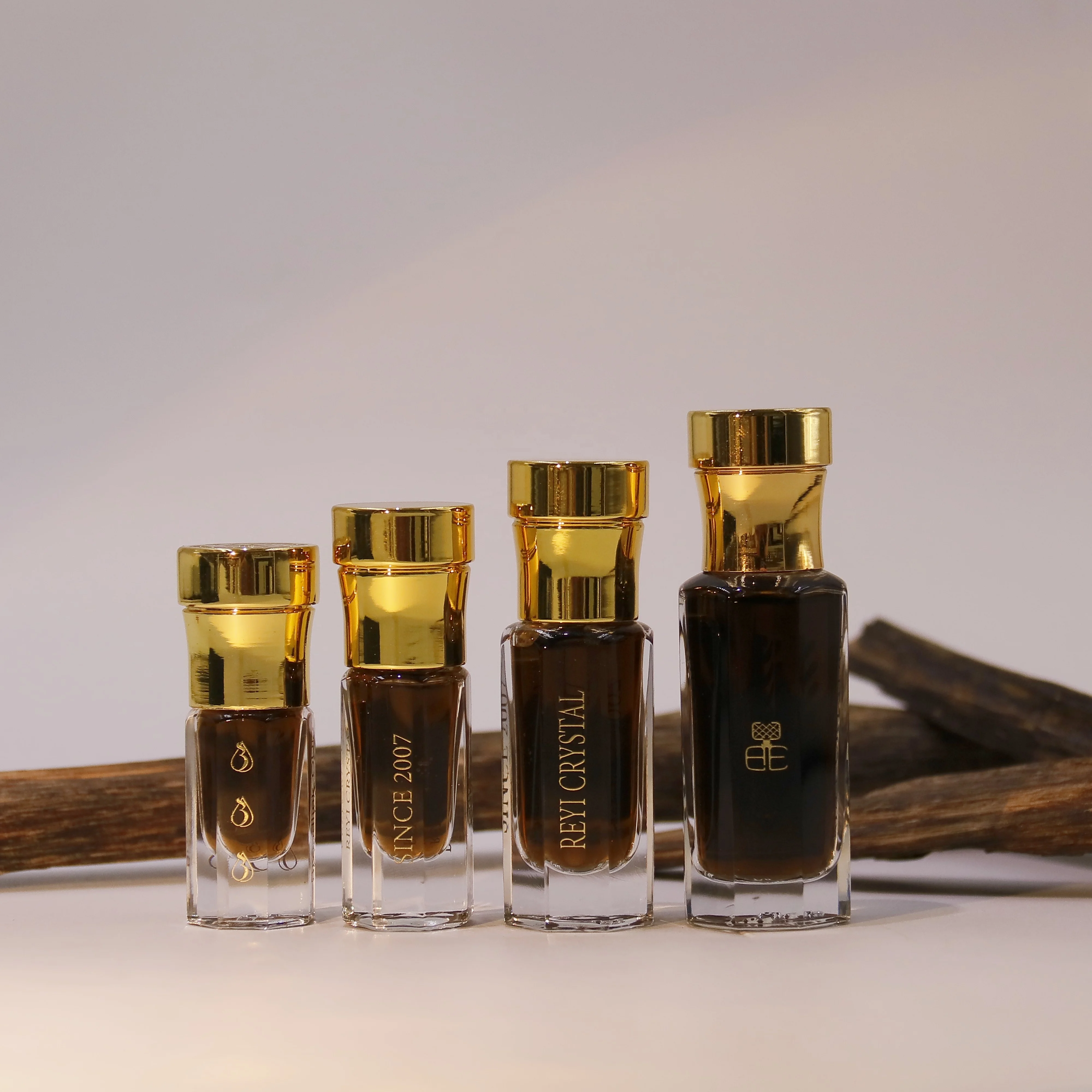 1.5ML Hot Selling Tall Arabic Attar Glass Oil Perfume Tola Bottle With Glass stick Roll on