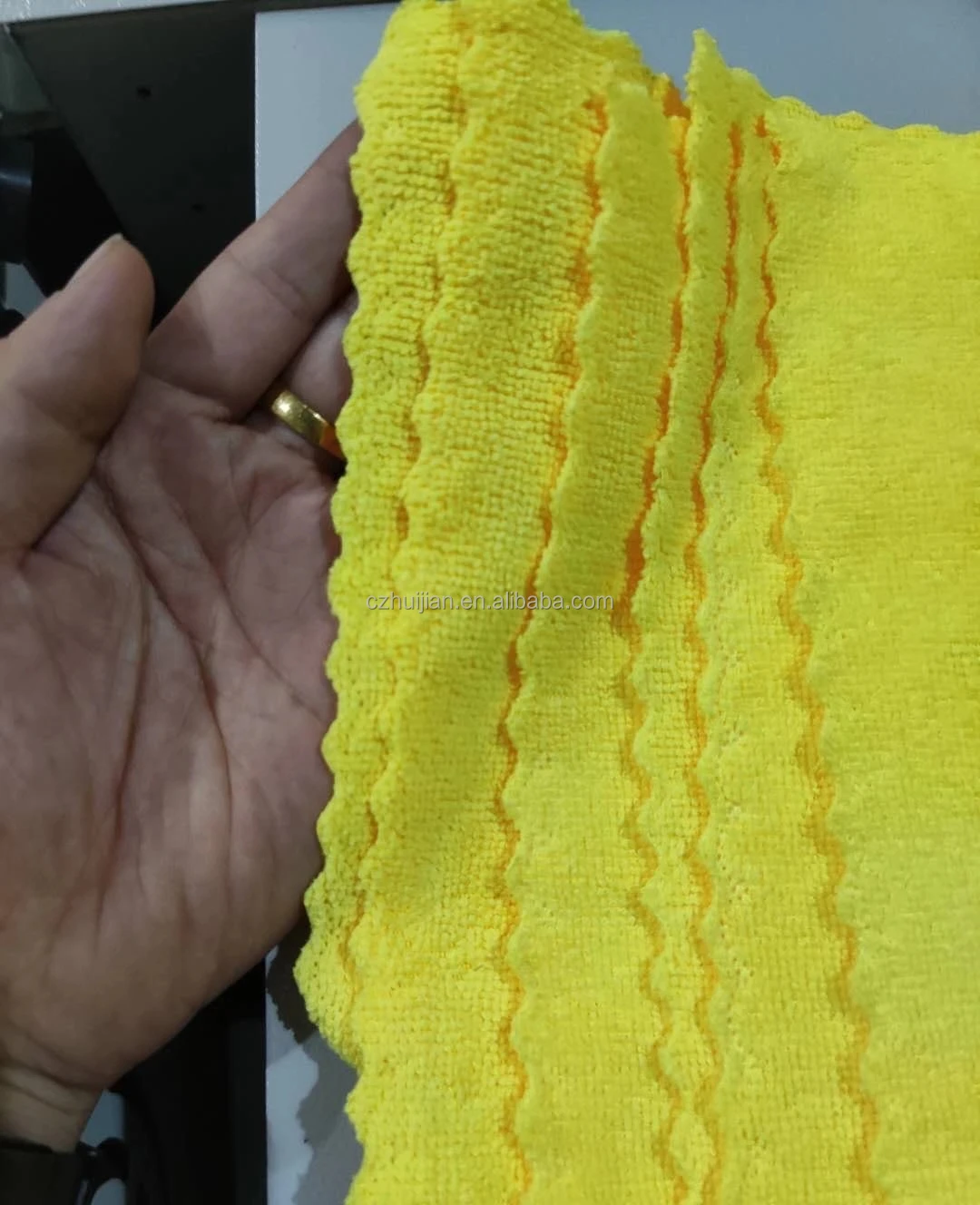 Automatic cleaning microfiber cloth slitting machine