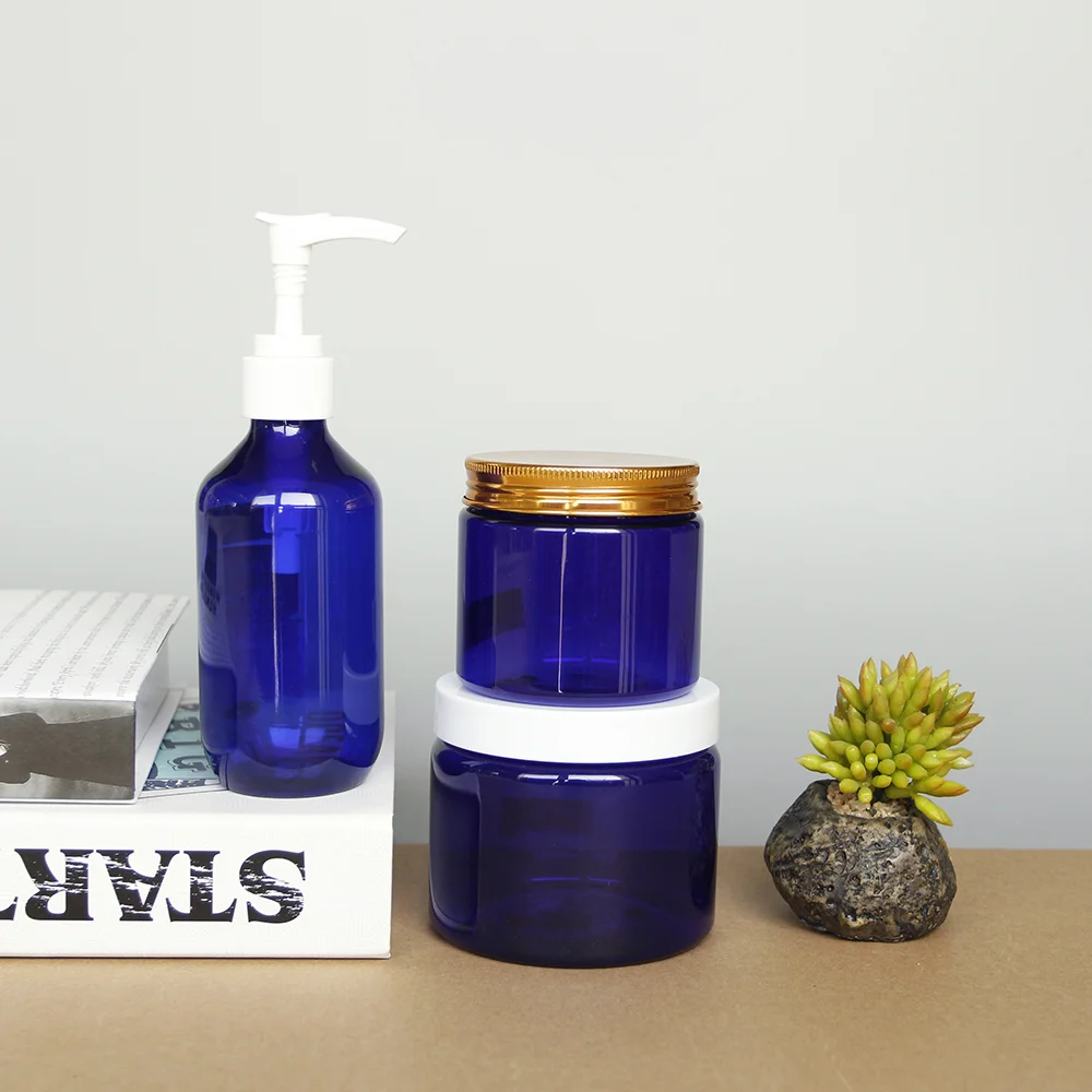 Wholesale 2 oz Blue Round Plastic Cosmetic Jar with White Screw Lids for Makeup Cream eye face cream