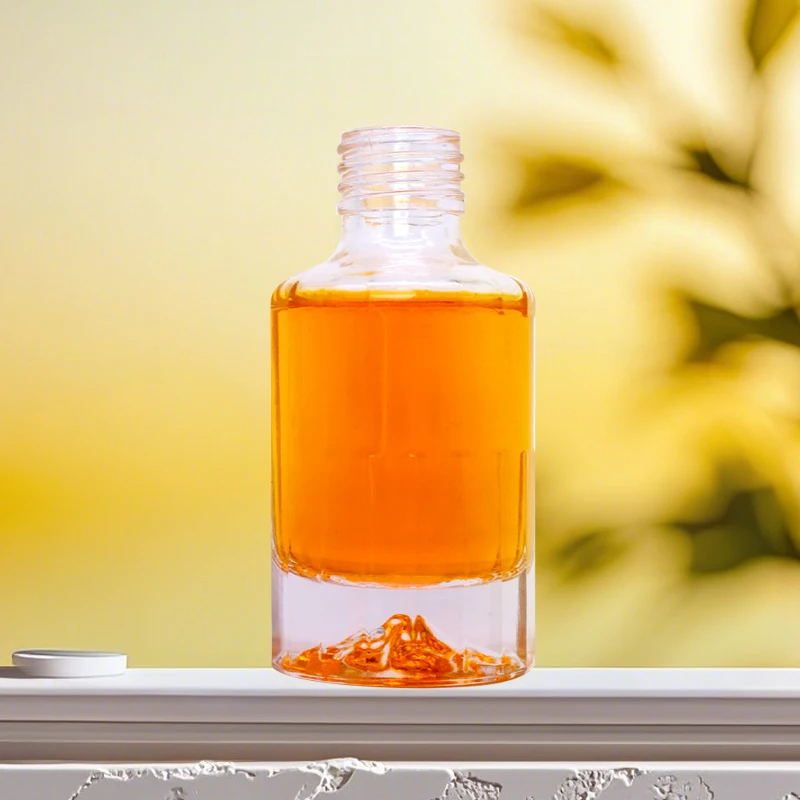 Wholesale 100ml 200ml glass wine bottle vodka fruit wine iceberg bottom design with plastic bottle cap