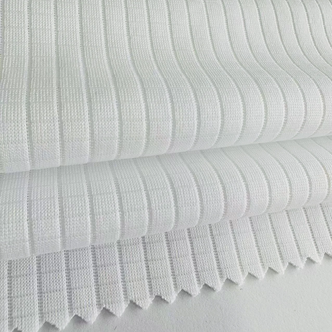Wholesale 130gsm 100%polyester soccer jersey fabric white dri fit fabric check jacquard fabric for sports shirt