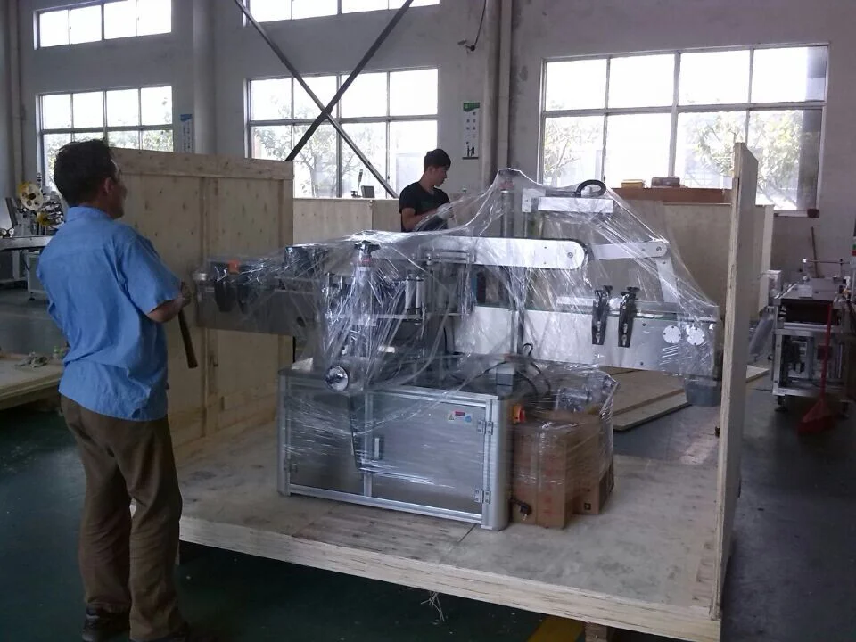automatic bottle placing fermented bean curd receiving are completed labeling