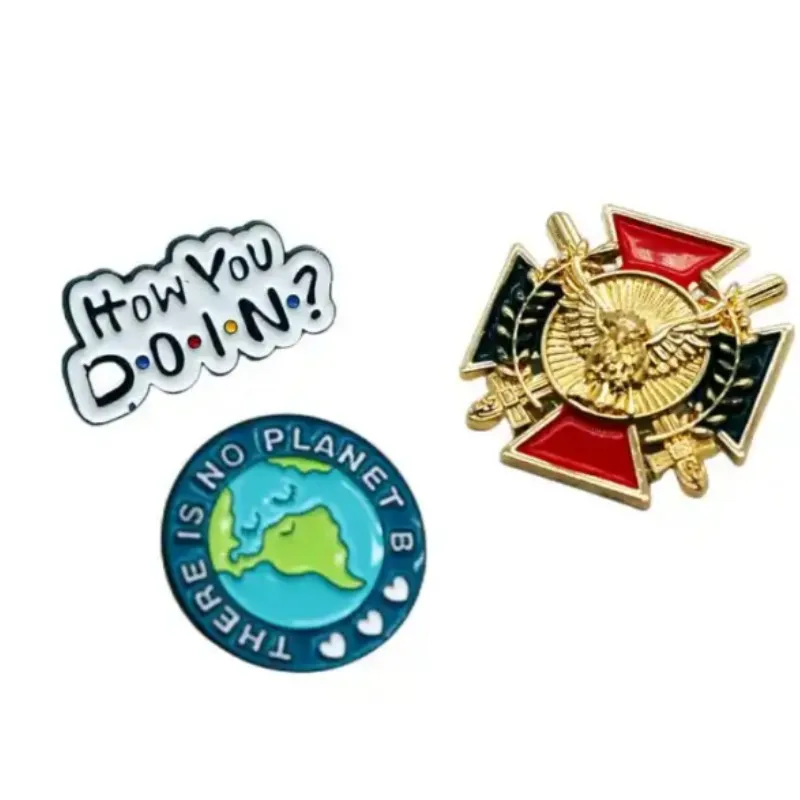 Металлическая брошь