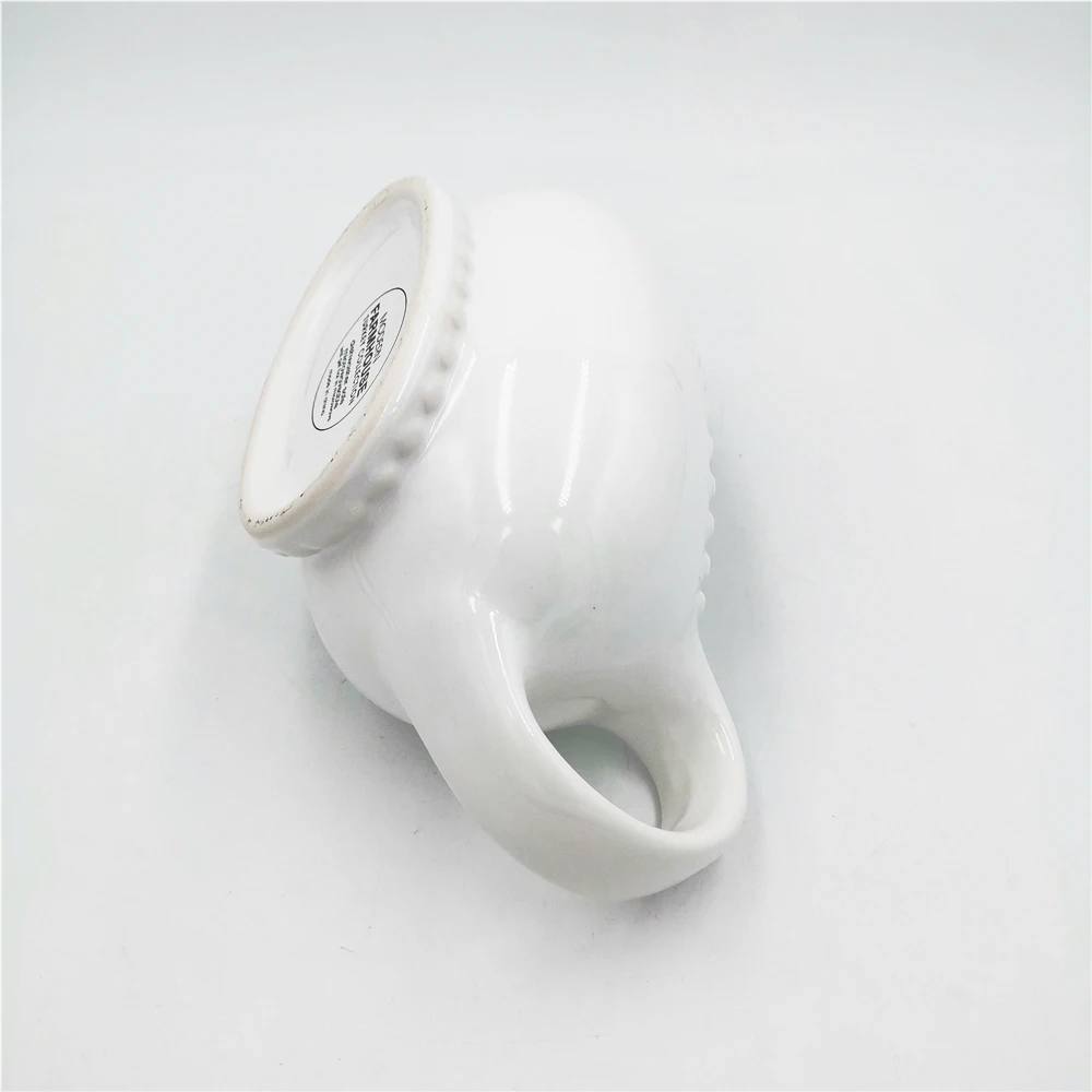 Wholesale cheap embossed dot White Easy-Pour Ceramic sauce Gravy Boat with