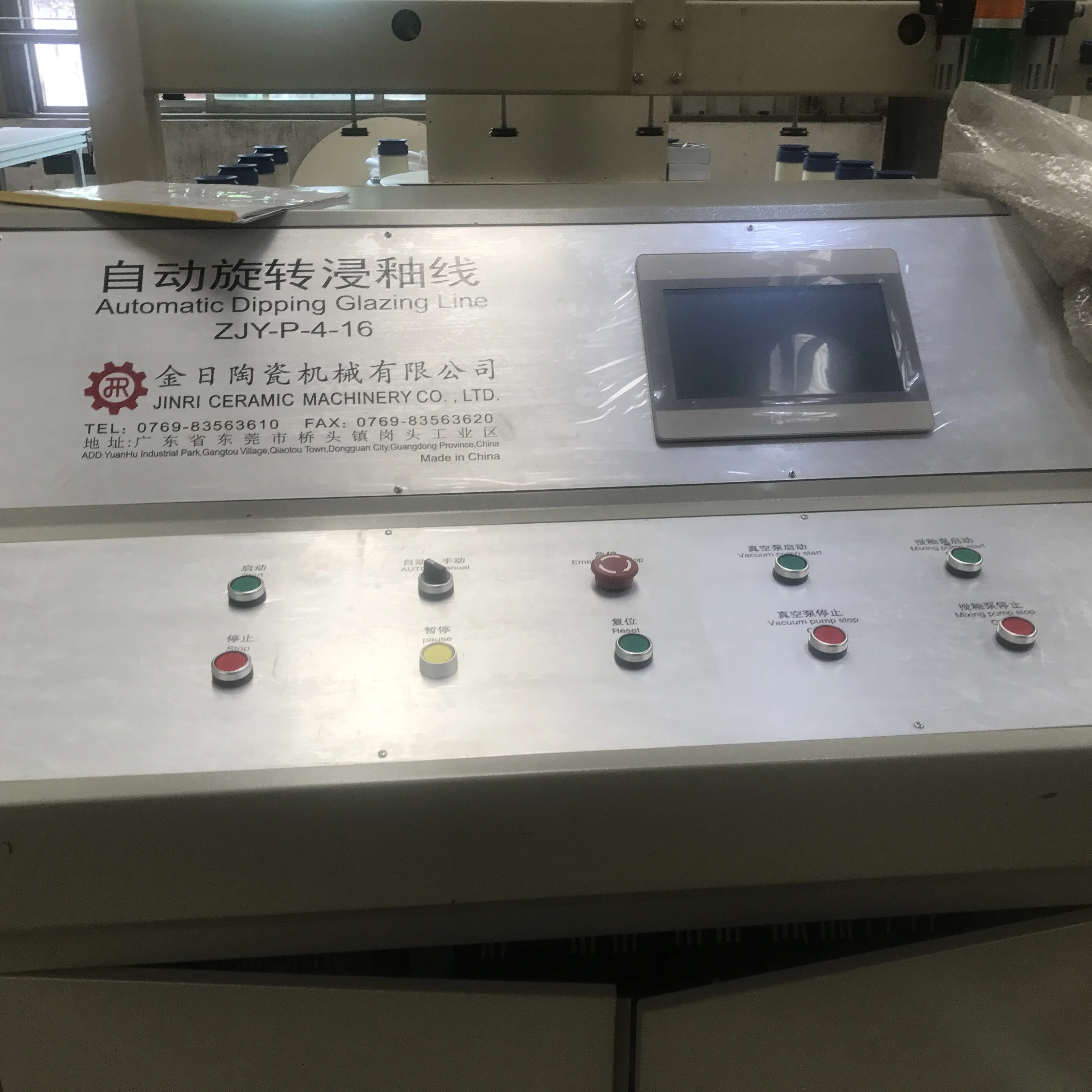 Automatic dipping glaze line for ceramic plates and tableware