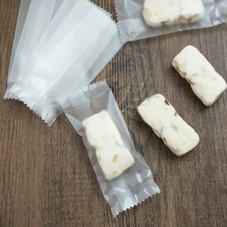 Custom heat seal clear nougat wrapper clear MOPP+CPP halva packaging roll film pillow bag filmfilm