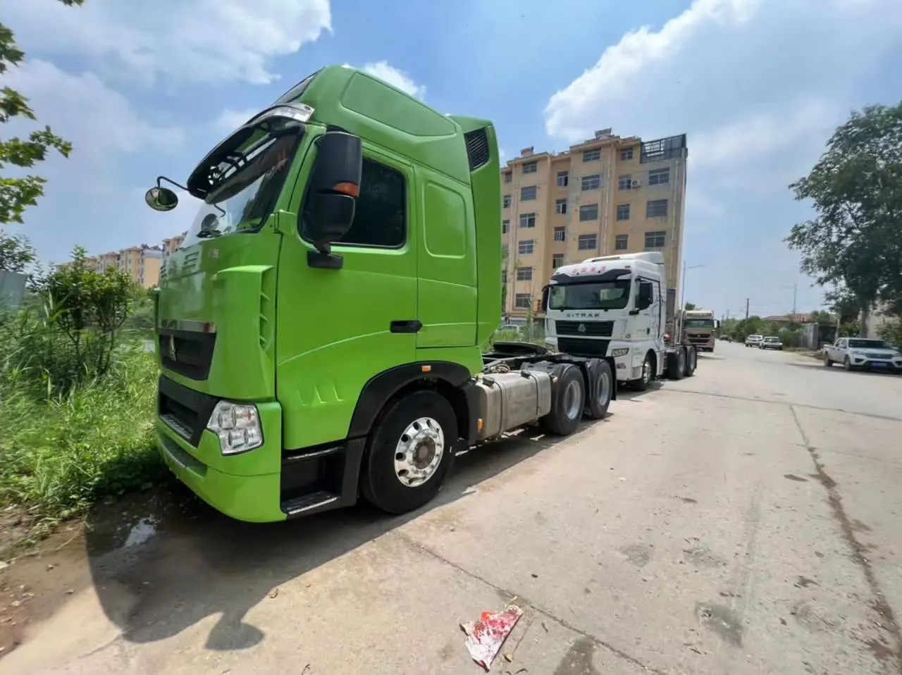 China Heavy Refurbished Used Sinotruk Howo 375HP 6x4 Diesel Left Hino Tractor Truck for sale