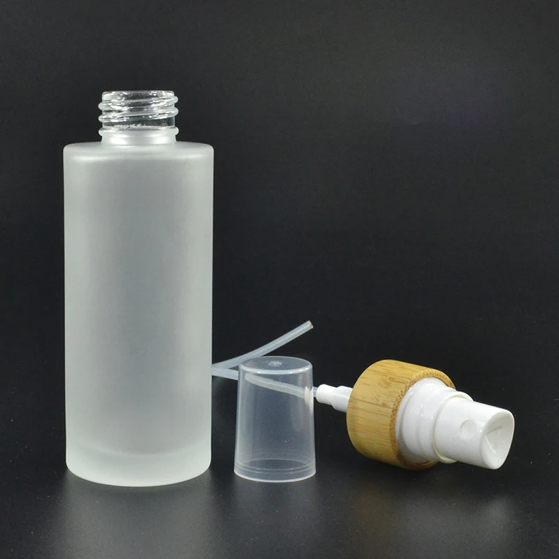 Wholesale Cosmetic Lotion Packaging 30ml 50ml 100ml 120ml 150ml Frosted Glass Spray Bottle With Bamboo Lid
