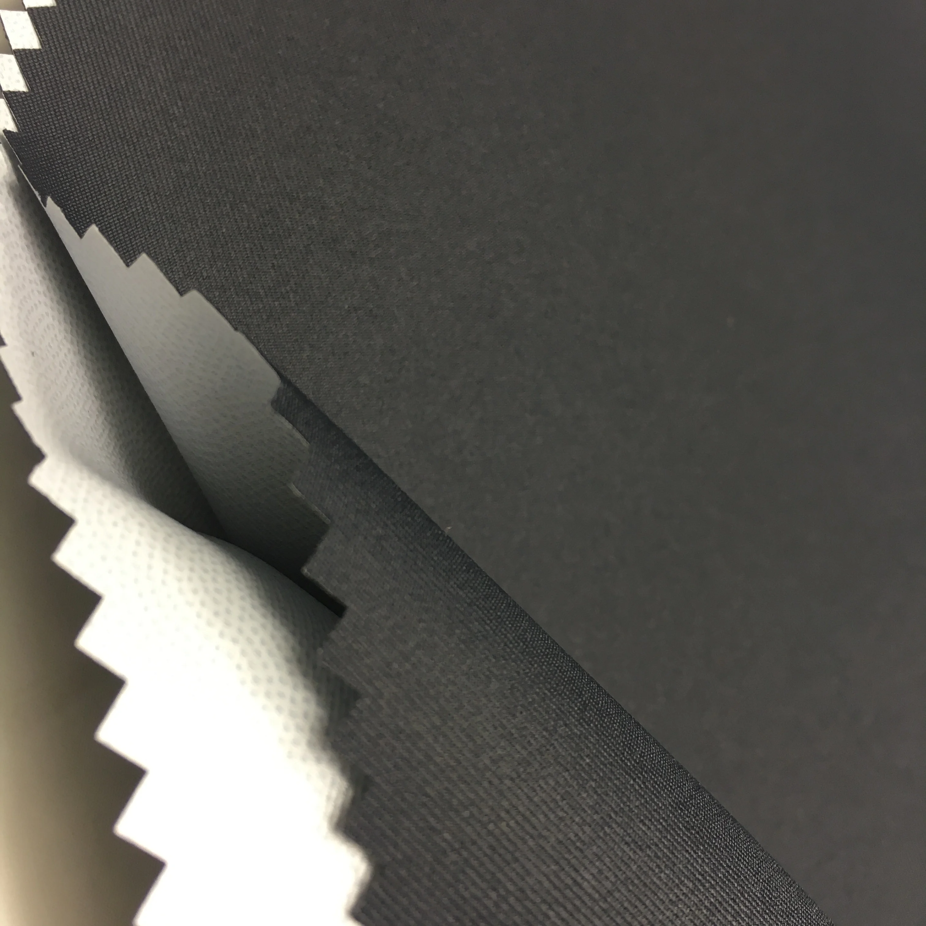 
Polyster gabardine twill pongee 0.12MM white breathable TPU membrane laminated dot bond finish touch fabric for padded jacket 