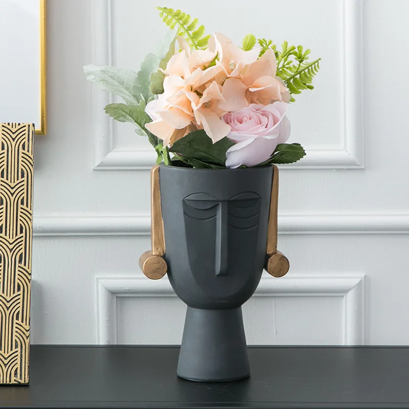 Wholesale 2021 home decor black resin face flower vase