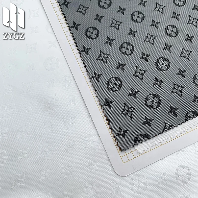 100 polyester 90GSM fashion brand jacquard yarn-dyed satin fabric clothing fabric lining wholesale