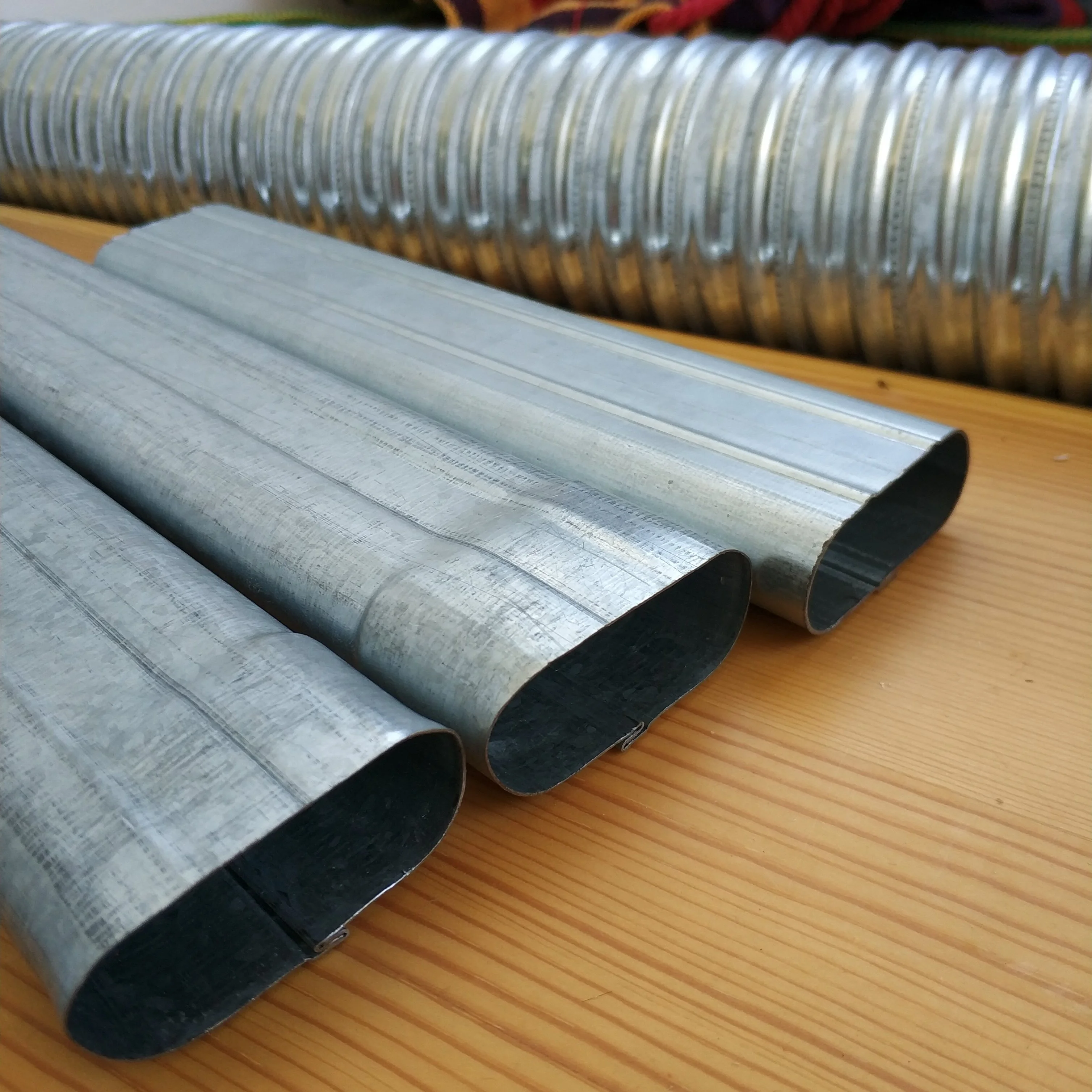 Simple innovative products Raw material galvanized steel strip 0.3mm-0.4mm thick auto wind duct making machine