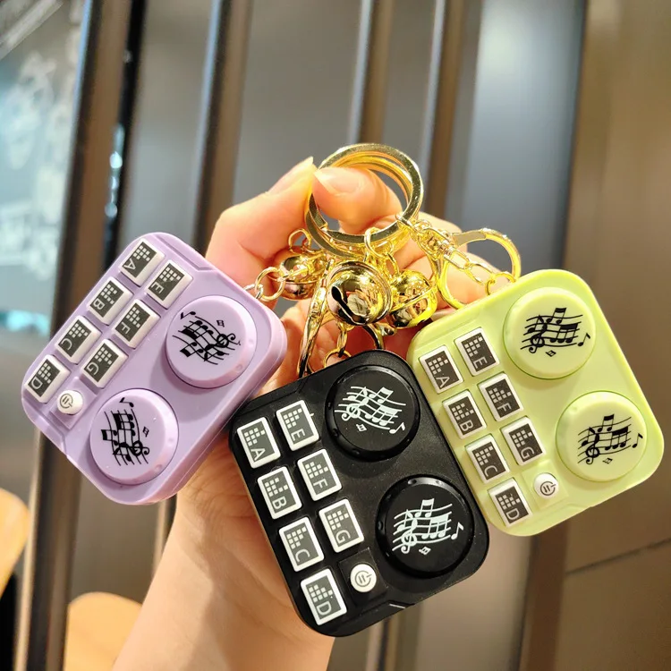 Hot mini musical instrument keychain sound button disc player key chain bag pendant claw machine small gift wholesale  keychain