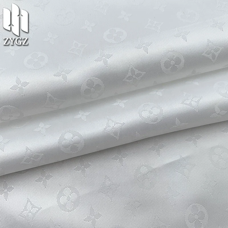 100 polyester 90GSM fashion brand jacquard yarn-dyed satin fabric clothing fabric lining wholesale