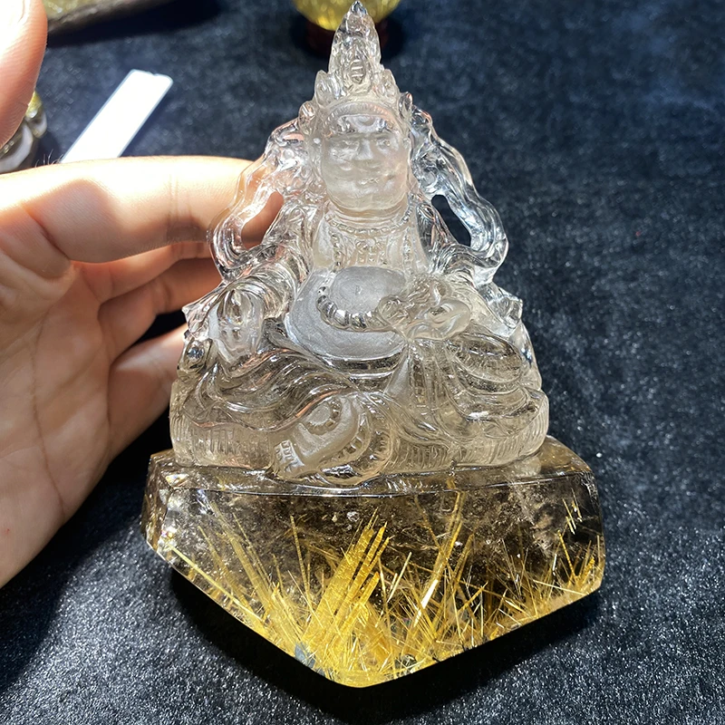 natural Golden Hair Crystal Hand carving Buddhist statue crystal crafts Rutilated Quartz God of wealth statuary for decoration