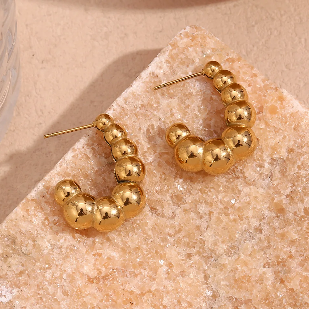 Оптовая продажа водонепроницаемые 18-каратные Позолоченные ювелирные изделия из нержавеющей стали 3d пузырьковая текстура золотые полые серьги-кольца для женщин