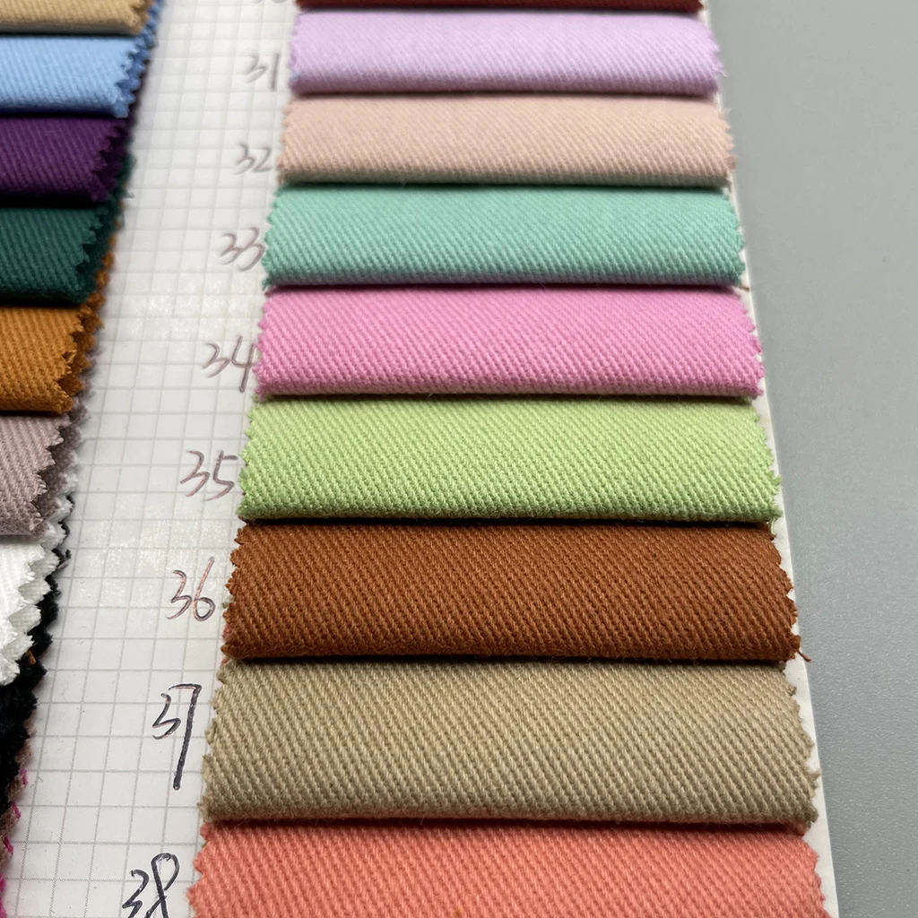 wholesale in stock 100% cotton stone wash shrinkage  twill khaki 32*10 275gsm fabric for Trousers, pants caps fabric