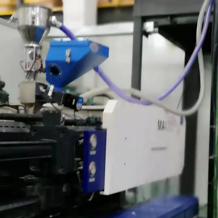 Volumetric Doser Injection Molding Machine and Plastic Injection Mould Making Machine