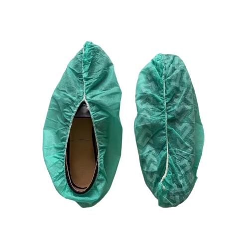 Disposable non-woven green anti-skid shoes with tire pattern overprint for hospital laboratory use