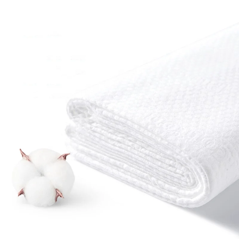 Wholesale Non-woven Fabric Adult Business Hotel Use Towel 100% Cotton White Disposable Bath Towel
