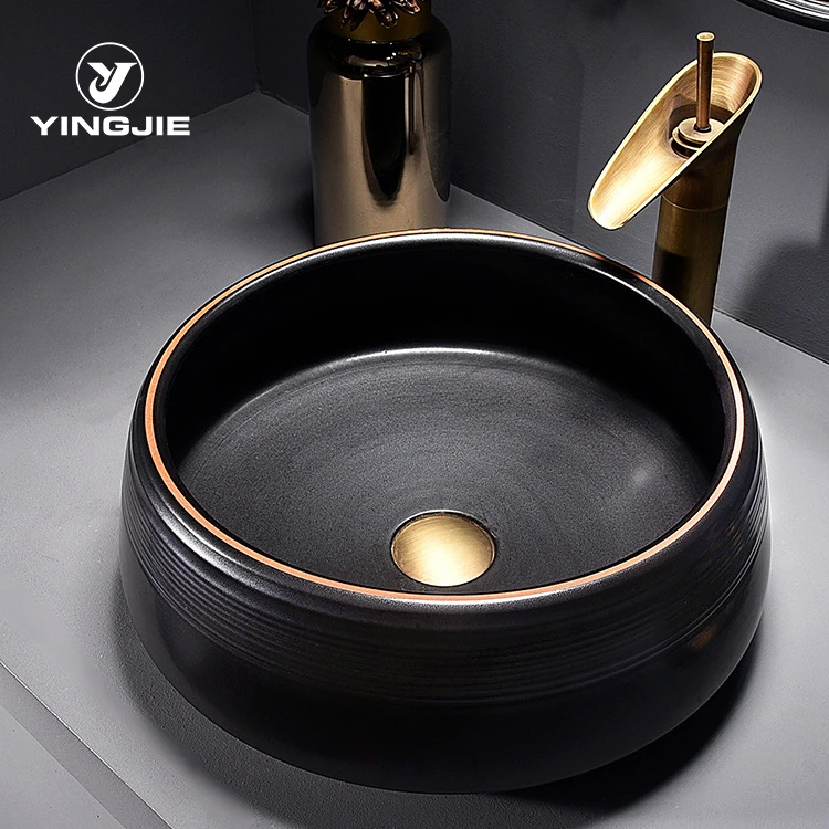 China Artistic Handmade Ceramic Wash Basin Round Counter Top Porcelain Sinks Carved Black Bathroom Sinks