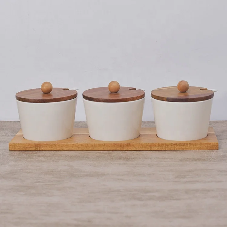 Hot sale kitchen used white ceramic spice pots seasoning pot spice jar with wood stand