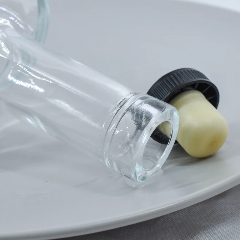 High quality 750ml  oval round glass wine liquor whisky bottle with cork