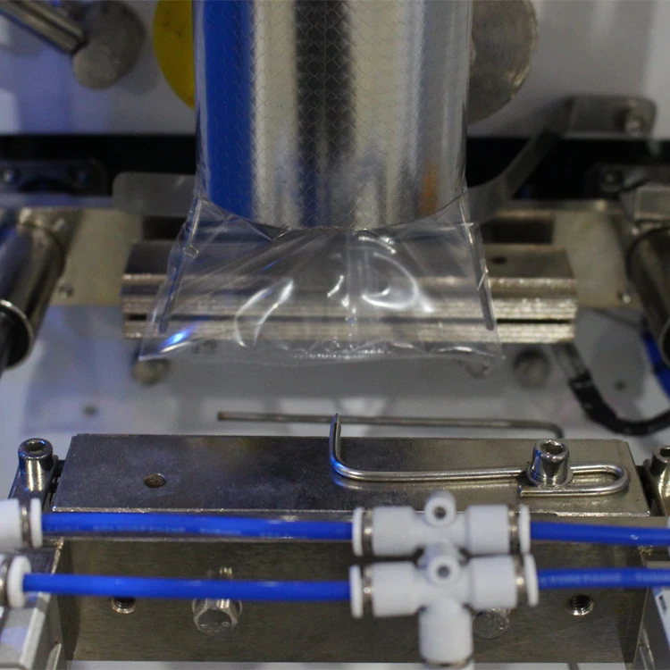 Alibaba Automatic Liquid Filling Packing Packaging Machine