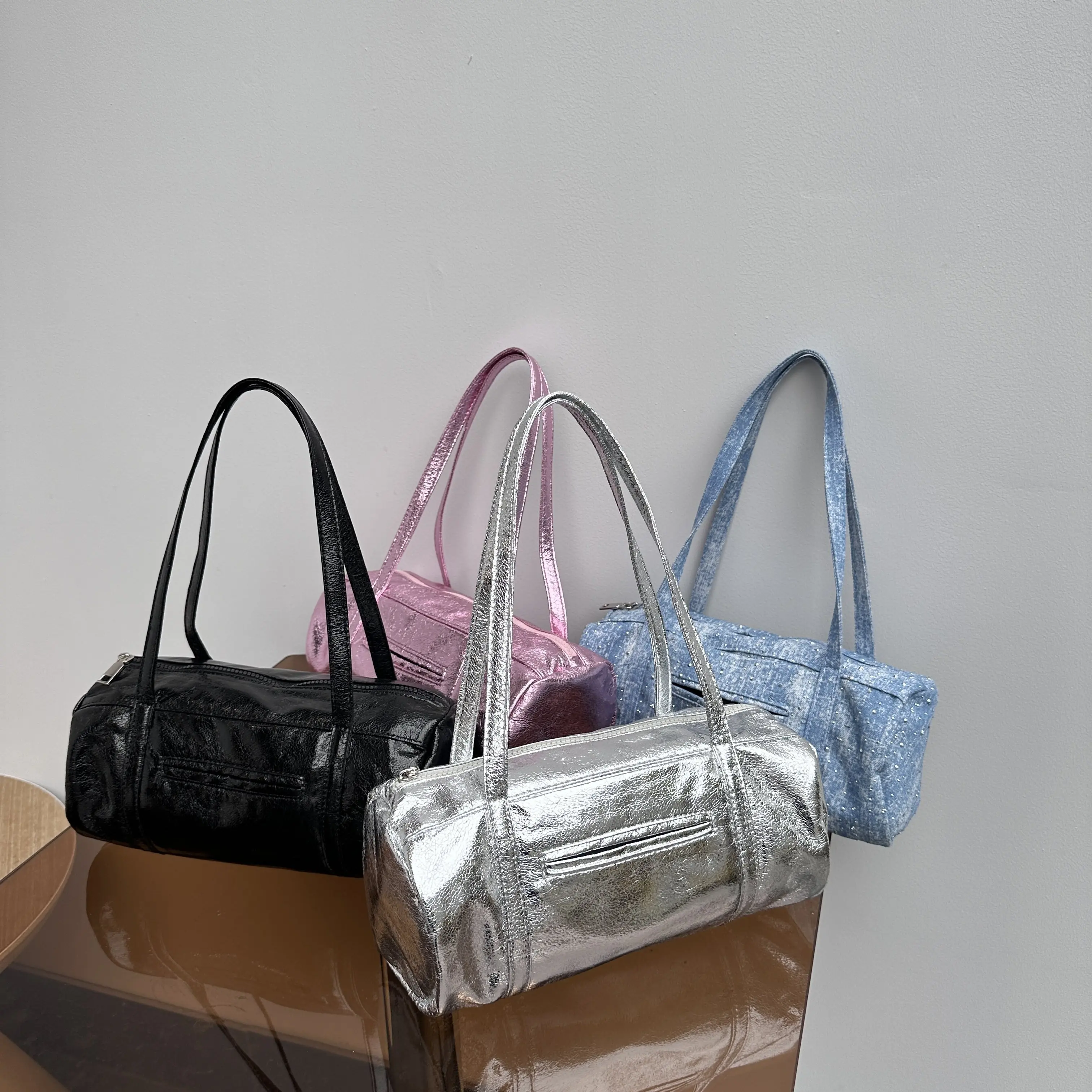 Glossy design niche armpit bag stylish cylindrical trendy shoulder handbag barrel bag for ladies 2024