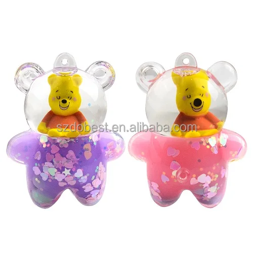 Yellow cute bear resin liquid floating key chain wholesale bag accessory keychains logo