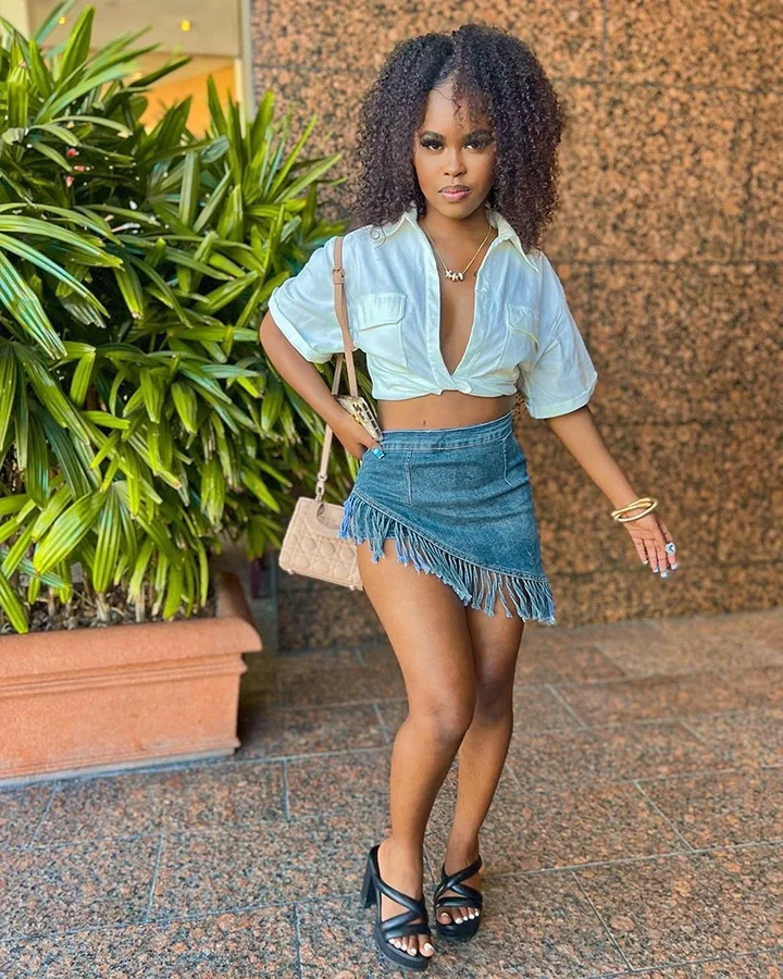 OUDINA Wholesale Streetwear Asymmetrical Mini Skirts 2023 Tassel Sexy Denim Skirt For Women