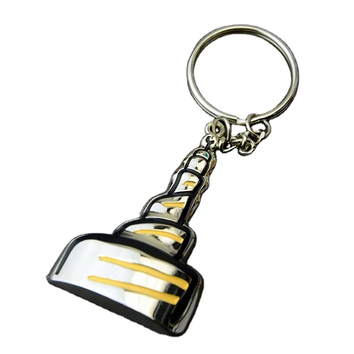 Изготовленный на заказ металлический брелок с полумесяцем и башней