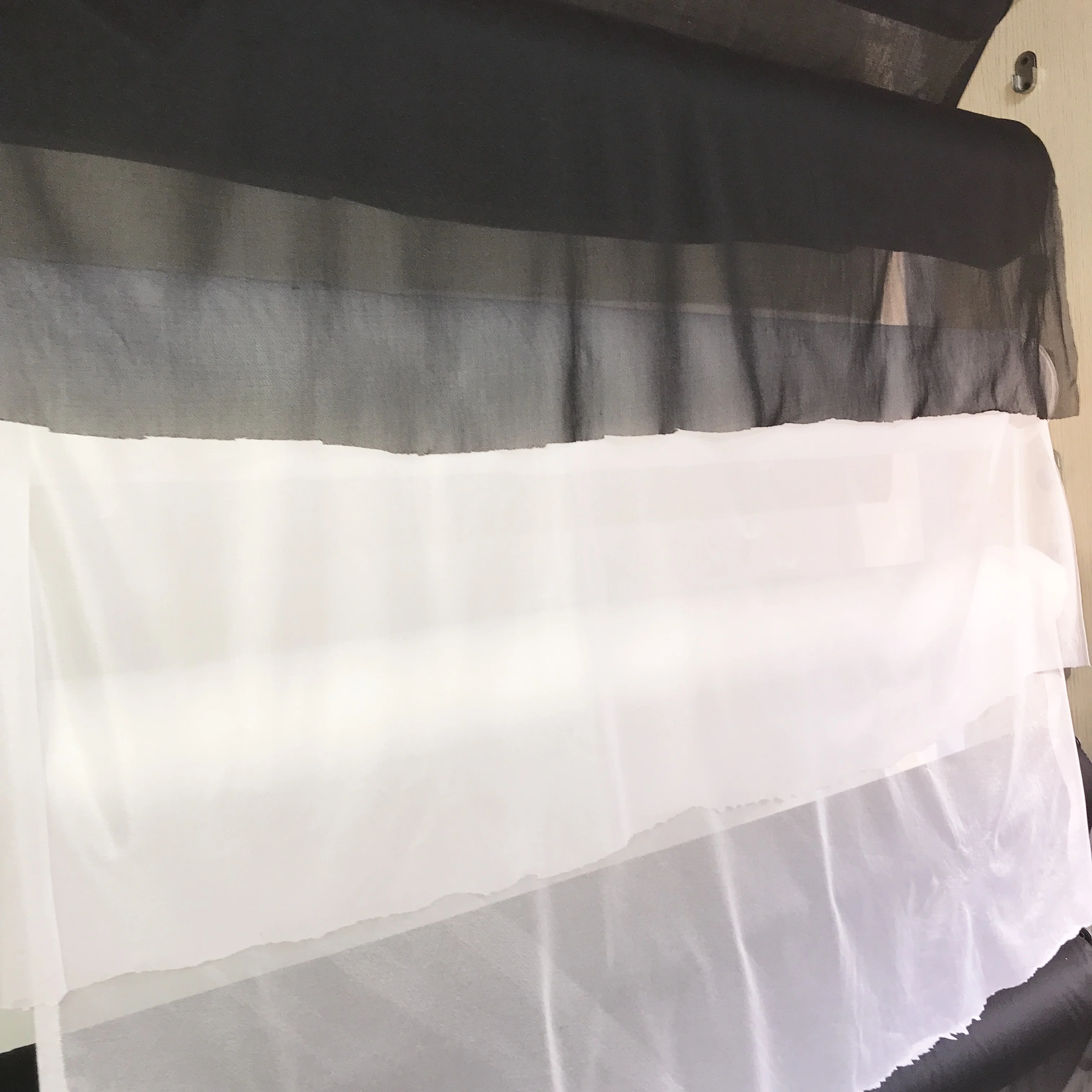 Circular elastic fusible knitted interlining fabric for garment backing